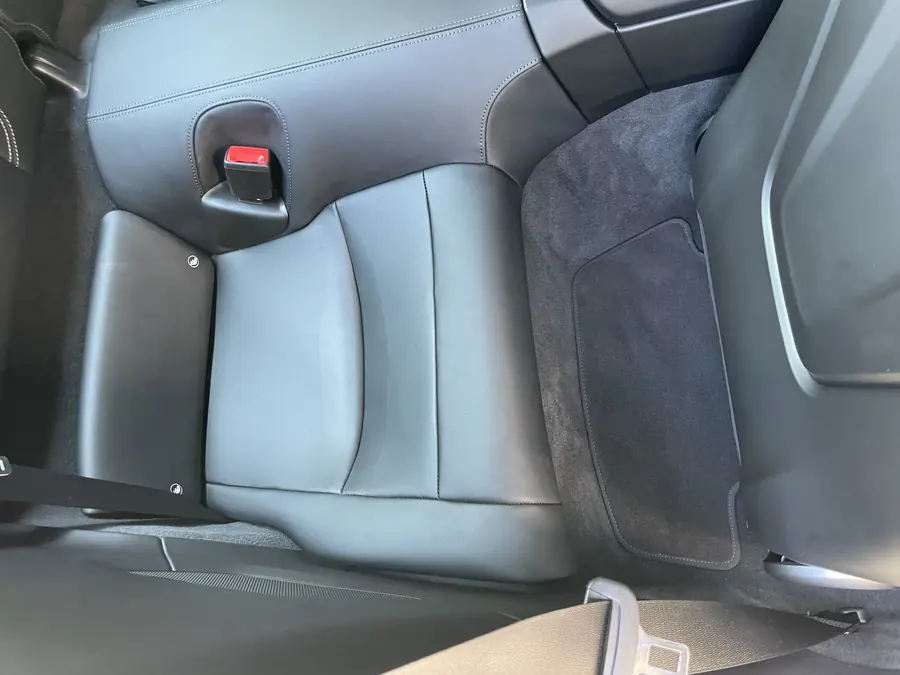 Porsche seat bolster up close after cleaning