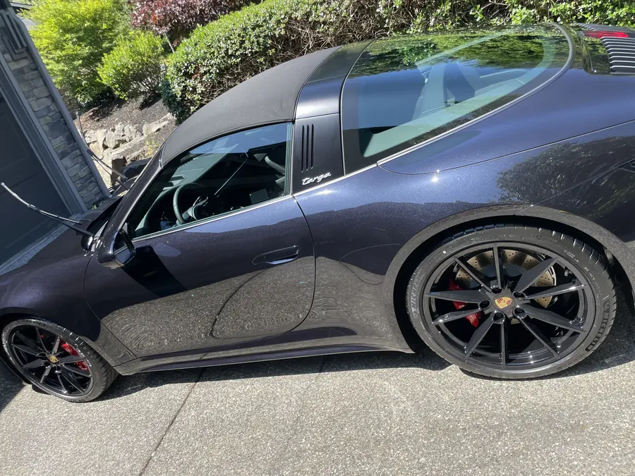 Dark blue Porsche 911 Targa with glossy paint and clean wheels